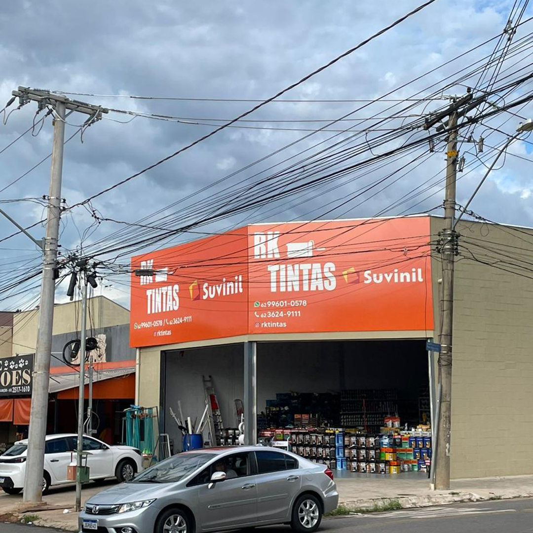 Fachada de Lona RK Tintas - - Logomarca Comunicação Visual